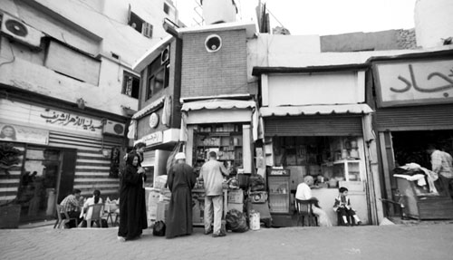 Residents walking the street of Cairo