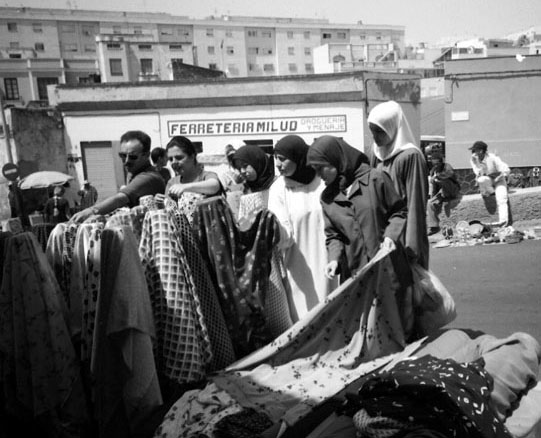 Local women shopping at the open market. Open markets occur everyday but Sundays.