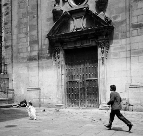 A Father is running after his baby girl after the wedding.
